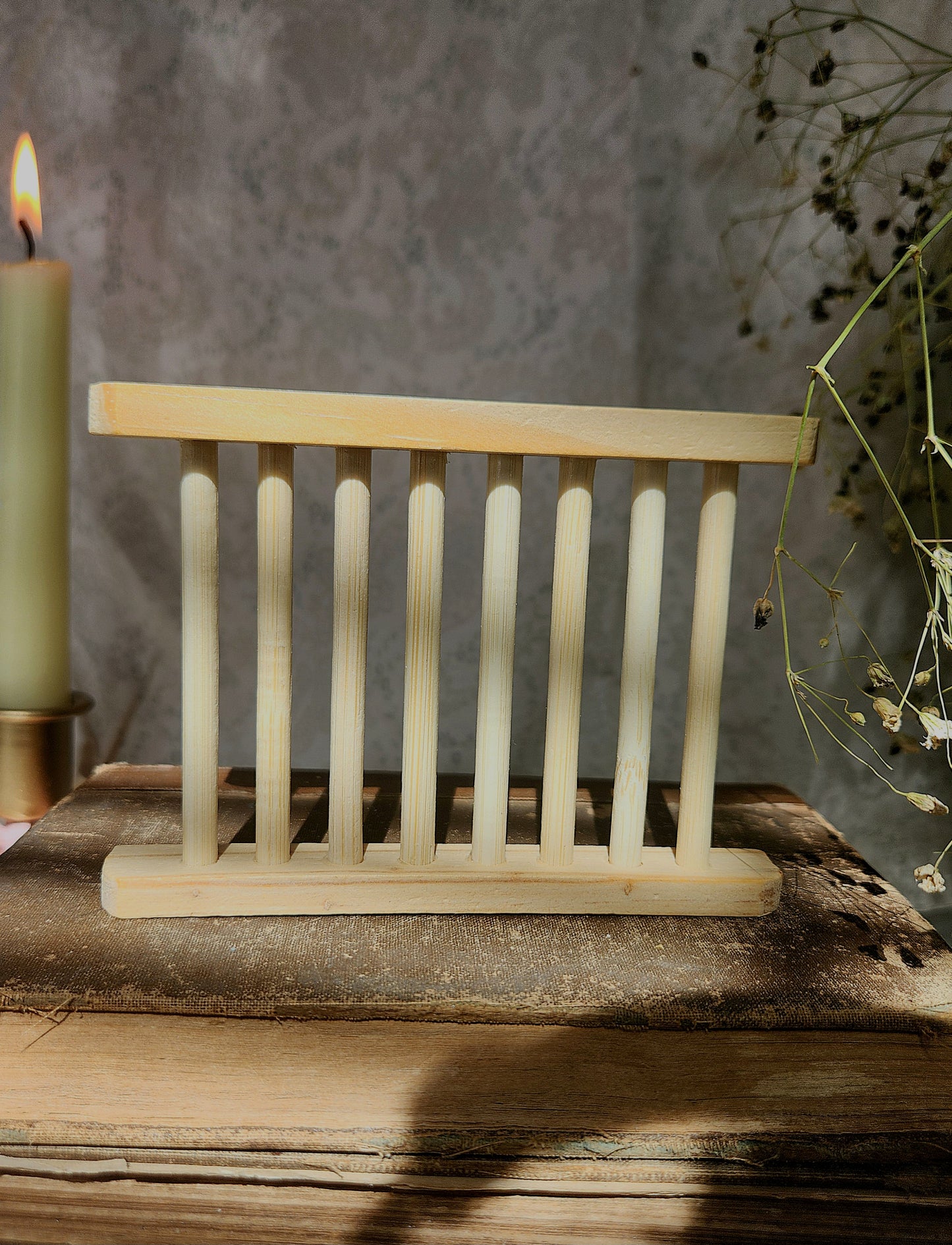 Wooden soap holder on a rustic surface